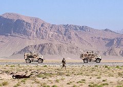 A Paratrooper from the 1st Brigade Combat Team, 82nd Airborne Division, searches for improvised explosive devices along Highway 1, July 23, 2012, in Ghazni Province, Afghanistan. Dismounted troops are often better at finding wires leading to IEDs. (U.S. Army photo by Capt. Thomas Cieslak, Task Force 1-82 PAO)